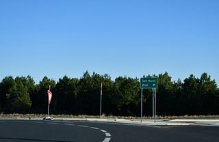 A residential street, Salt Marsh Boulevard was also realigned, tieing into the roundabout with SR 1D/23 across from Belltown Road.