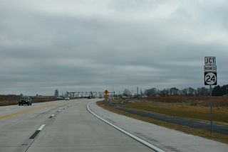 SR 24 Business returns to SR 24 (North Millsboro Bypass) north from Millsboro along John J. Williams Highway.