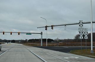 SR 24 Business (John J. Williams Highway) angles 1.5 miles southwest across Millsboro to SR 24 along Laurel Road. Hollyville Road (Rd 305) extends 5.8 miles north from Millsboro to SR 5 at Hollyville.