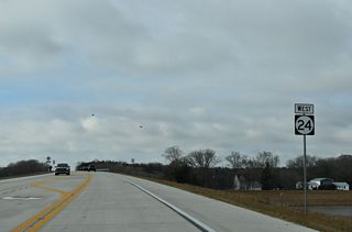 SR 24 continues west across SR 30 (Gravel Hill Road) and northern reaches of Millsboro Pond.