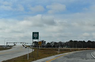 The exit for U.S. 113 north departs from SR 24 (North Millsboro Bypass) west ahead of the signalized intersection with Betts Pond Road (Rd 20B). U.S. 113 meets U.S. 9 at Georgetown in seven miles.