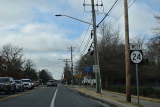 SR 24 follows Laurel Road west from U.S. 113/SR 20 (Dupont Boulevard) and SR 24 Business (Washington Street) to the Millsboro town line, and Millsboro Highway from there southwest to Mission.