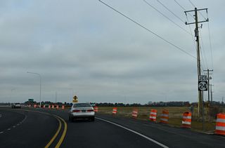 John J. Williams Highway was realigned northward to intersect the North Millsboro Bypass across from Hollyville Road. The old roadway east of the junction shield for SR 24 was removed.