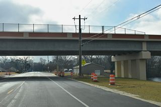 The North Millsboro Bypass opened to traffic on September 26, 2025. The realignment of SR 24 includes a viaduct spanning SR 30 and adjacent Millsboro Pond.