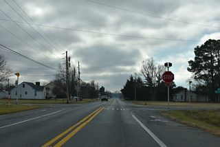 Morris Mill Road (Rd 297) connects SR 30 (Gravel Hill Road) with Zoar Road (Rd 48) by Morris Millpond to the northwest of this stop sign at Mount Joy. Mount Joy Road extends Rd 297 east to SR 5/24 (John J. Williams Highway) and Oak Orchard Road at Harmon.