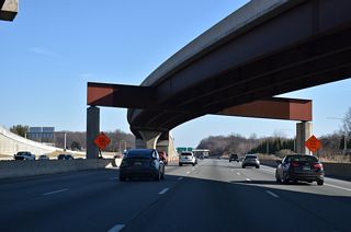 The northbound SR 1 ramp connects with both sides of I-95, dispersing traffic well ahead of the split with I-295. It opened to traffic on October 17, 2013.