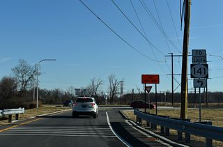 Part of the 2024-25 construction adding capacity improvements to I-295 northbound from I-95 and SR 141 to U.S. 13, a roundabout was constructed where Exit 5 A ties into Airport Road.