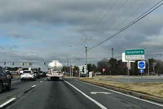 SR 18/404 (Bridgeville Road) arc southeast from U.S. 113 onto N Bedford Street to the Georgetown Circle with U.S. 9. SR 18 ends there while SR 404 combines with U.S. 9 east to SR 1 (Coastal Highway) at Five Points.