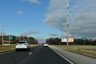 U.S. 113 enters the city of Milford north of Herring Branch.