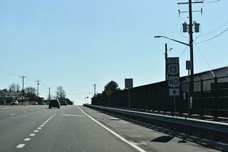 Trailblazers for U.S. 13/40 appear south of SR 37 as Basin Road runs alongside the Delaware Air National Guard complex at New Castle County Airport (ILG).