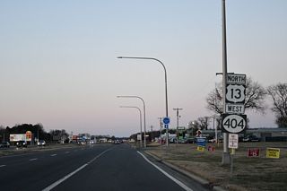 Several businesses line U.S. 13/SR 404 (Sussex Highway) north to Rifle Range Road (Rd 545). SR 404 Business and Tatman Farm Road parallel close by.