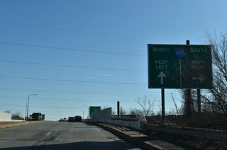 12th Street spans Norfolk Southern Railroad tracks ahead of the southbound entrance ramp for Interstate 495.