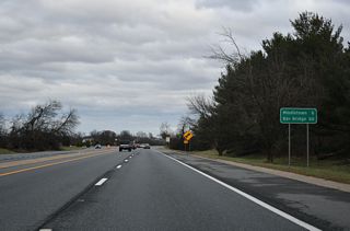 Turning east, SR 71/896 pass the Summit Bridge Farms subdivision. Downtown Middletown is 6.3 miles to the south along SR 71 (Broad Street).