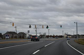 Old Summit Bridge (Rd 63), the alignment of SR 71 before 1960, ties into SR 71/896 at the succeeding traffic light east of SR 15. Old Summit Bridge road spurs 0.80 miles to the north.