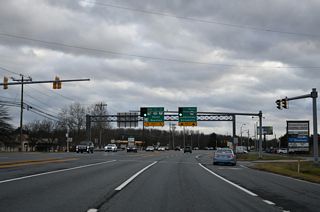 Traffic lights were added at Summit Village Shopping Center in 2008 along SR 71/896 (Summit Bridge Road) just north of their separation.