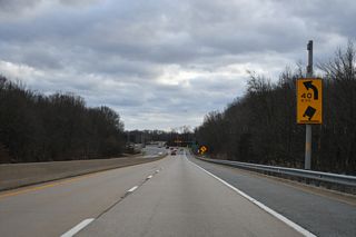 SR 71/896 lower from the Summit Bridge into a broad curve ahead of SR 15.