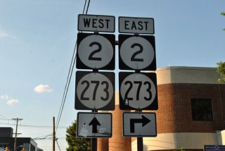 This assembly predated the 1988-relocation of SR 2 away from Downtown. Delaware Avenue flows eastbound from S Main Street to Library Avenue (SR 72).