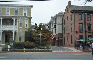 Academy Street advances one block from Delaware Avenue to East Main Street (SR 273) west.
