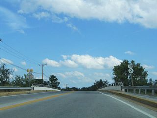 Spanning the CSX Railroad, a left over SR 2 shield assembly remained from before the 1988 relocation away from Elkton Road.