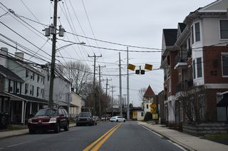 Vehicles exceeding the low bridge clearance are directed off Chapel Street via New Street back to Main Street.