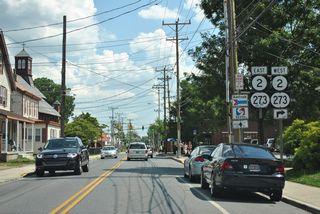 SR 2/SR 273 shield assembly posted ahead of E Main Street. Signs for Amtrak, SEPTA, and snow removal took the place where SR 72  was originally signed. All route shields were re moved here in 2019.