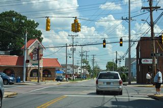 Chapel Street southbound at E Main Street. Since 1990,  mixed use development dramatically transformed E Main Street through Downtown Newark.