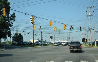 A vintage truss arm remained in use for the signal above Margaret Street at Cleveland Avenue / N Chapel Street. Margaret Street was converted to one-way at Cleveland Avenue in 2019, eliminating the signal.
