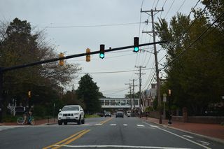 A pedestrian signal operates at College Avenue and Kent Way west.