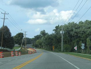 Climbing out of Newark, Paper Mill Road intersects SR 72 (Possum Park Road) at Milford Crossroads.