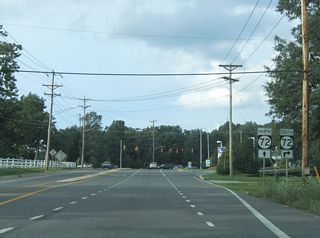SR 72 overtakes Paper Mill Road east from Thompson Station Road. Thompson Station Road extends northward from Possum Park Road into White Clay Creek State Park.