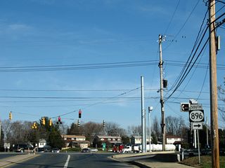Welsh Tract Road east at SR 896 (South College Avenue). Span wire signals here were replaced with mast-arm based assemblies by 2016.