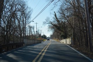 Old Baltimore Pike crosses the Christina River just west of SR 72 and Cooch's Bridge Battlefield. The 64 foot long open-spandrel arch bridge here dates back to 1922.1