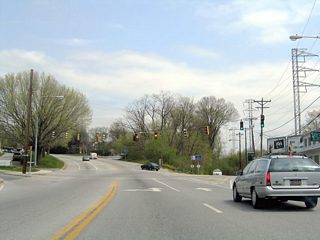18th Street lowers from Augustine Cutoff north below the adjacent CSX Railroad and across Interstate 95 before entering the Triangle neighborhood of the city at Broom Street. Baynard Stadium lies just east of the parallel railroad line.