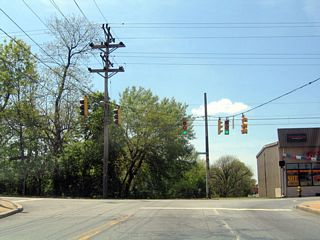 Mast arm supported traffic lights replaced this span wire assembly at the west end of Greenhill Avenue at SR 48 (Lancaster Avenue) by 2014.