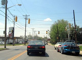 Fourth Street lowers from the CSX Railroad to meet Greenhill Avenue at a signalized intersection. The remainder of 4th Street north serves local traffic to the Westmoreland community.