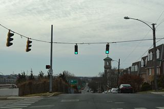 Jackson Street south at W 6th Street and the Hilltop neighborhood.