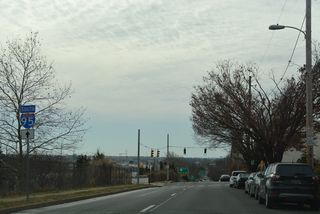An I-95 trailblazer stands along the block of Jackson Street between 7th and 6th Streets.
