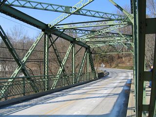 Work in 1979 replaced the concrete deck and several rivets with higher strength steel bolts.