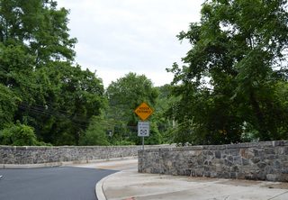 New Bridge Road connects Rising Sun Lane and Main Street with SR 141 northbound along Powder Mill Road.