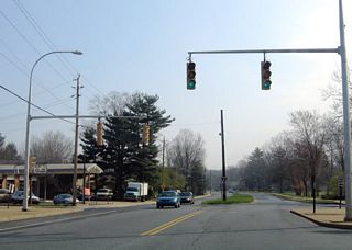 A compact traffic rotary joins Washington Street with Matson Run Parkway at West 40th Street. Matson Run Parkway winds northward through the Brandywine Hills community.