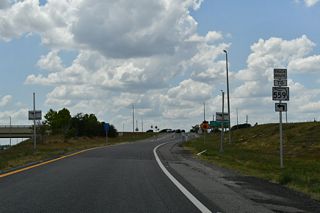 Unsigned CR 559 extends 6.96 miles south from SR 559 and nearby C. Fred Jones Boulevard (SR 559A) to Lake Ariana and U.S. 92 beyond Downtown Auburndale. SR 559A links SR 559 with the continuation of the route south along Berkley Road (former CR 655) through western Auburndale.