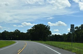 Continuing east into Camp Blanding, SR 16 converges with the east end of SR 230 by Kingsley Lake. SR 230S links SR 16 east with SR 230 leading south to the West Gate of Camp Blanding and west back to Starke.