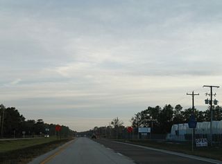 The shield for CR 214 west at Sungarden Road was removed from U.S. 17 south by 2011. Straddling the Putnam County line nine miles west to S Bellamy Road, the entire length of Sungarden Road is unpaved.
