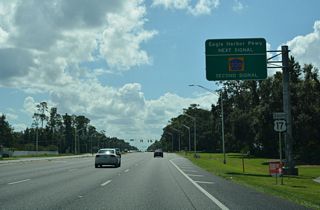 Eagle Harbor Parkway intersects U.S. 17 ahead of the commercialized stretch along County Road 220 (Doctors Inlet Road).