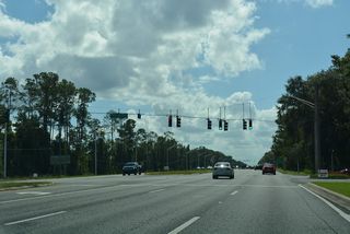 Eagle Harbor Parkway winds west to the Eagle Harbor Golf Club community, which spreads northwest along Fleming Island to Catfish Point on Doctors Lake.