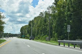 U.S. 17/SR 16 leave the Green Cove Springs street grid across Green Cove Springs Nature Preserve. SR 16 resumes east from U.S. 17 at the signalized intersection with Cooks Lane.