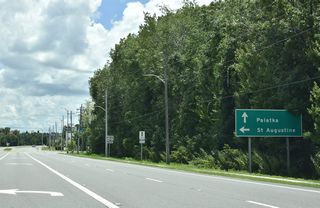 SR 16 (Leonard C. Taylor Parkway) continues east past Reynolds Airpark (FL60) to the Shands Bridge spanning the St. Johns River. The state road travels across St. Johns County to U.S. 1 in St. Augustine.