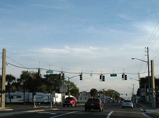 Orange Avenue continues south into the Green Cove Springs business district at Gum Street.