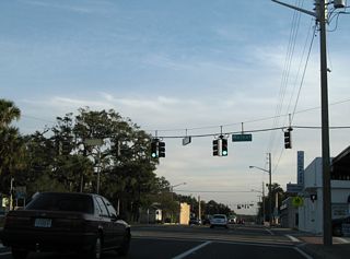 Walnut Street intersects U.S. 17 (Orange Avenue) two blocks west of the City Pier on the St. Johns River.