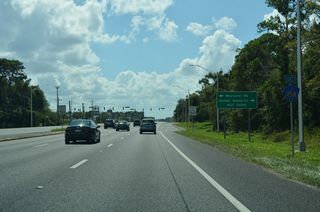 Westover Road spurs southeast to a neighborhood along the St. Johns River from U.S. 17 at the traffic light with Harbor Island Drive east. The junction shield for CR 15A was removed by 2022.